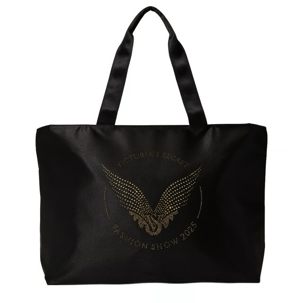 NWT 2025 FASHION SHOW TOTE BAG. RHINESTONE VS ANGEL WINGS. ZIPPER CLOSURE.